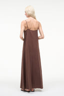 Maxi slip dress back view in dark chocolate brown with thin spaghetti straps