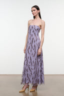 Lilac strapless maxi dress with black speckled print, side view