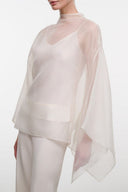 FIA top in ivory sheer fabric, long sleeves, high neckline