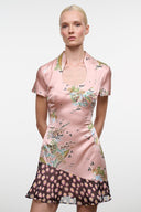 Pink silk dress with scoop neck, short sleeves, floral print and ruffle hem
