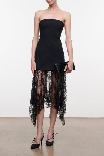 Black strapless dress with fitted bodice and fringed mesh overlay midi skirt