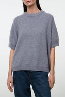Ash cashmere sweater with crew neck, short sleeves, and ribbed hem.