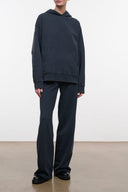 Washed black terry pants with relaxed straight-leg fit and elastic waistband