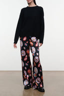 Black silk pants with multicolor circular paisley print, wide leg silhouette