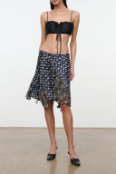 Dark multi-pattern silk skirt with elastic waistband and flared ruffled hem