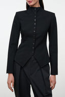 Black button-front jacket with high collar and long sleeves, fitted silhouette.