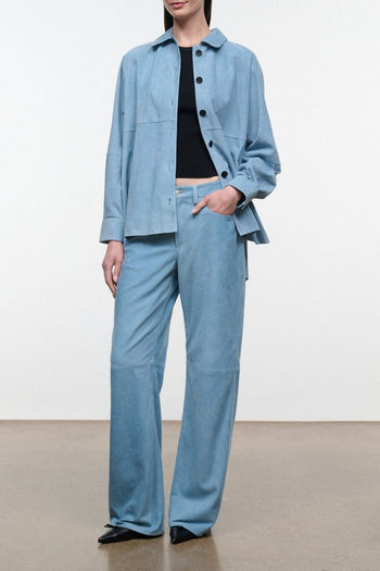 Light sky-blue button-up shirt with pointed collar and front pockets