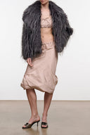 Shaggy dark fur jacket with open front and wide shoulders