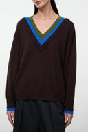 Dark brown V-neck pullover sweater with blue and green striped trim at neckline and cuffs