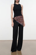 Silk scarf tied at waist, black with red and orange striped abstract pattern