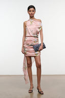 Pink one-shoulder silk mini dress with tapestry floral print and long sheer side drape