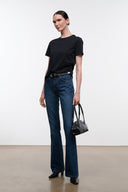 Dark indigo flare jeans with high-rise fit, belt loops, and 5-pocket design