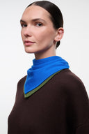Brown knit sweater with blue cowl neck and green accent edge