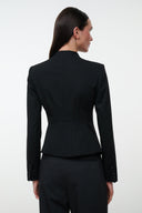 Black fitted jacket with high back and button details at center back