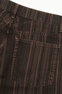 Dark espresso-striped jeans with front patch pocket and visible topstitching
