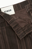 Dark espresso-striped relaxed jeans with STAUD label on the inner waistband