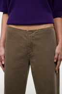 Taupe jeans with waistband seam and center fly placket detail