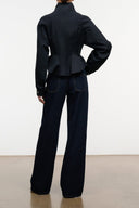 Indigo wide-leg jeans, back view, with belt loops and rear patch pockets