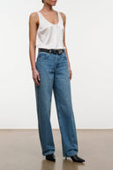 High-rise blue denim jeans with wide leg and front crease, belt loops