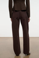 Dark brown high-rise jeans with back patch pockets and straight wide leg