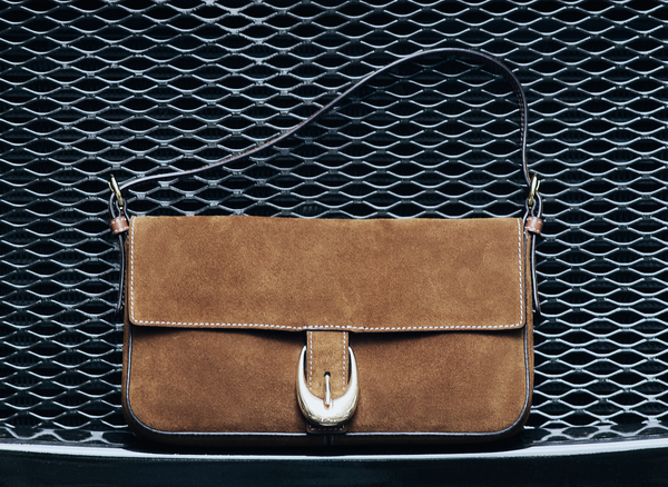 a tan suede handbag