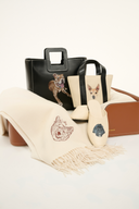 <p>The perfect gift for a friend—or yourself. Get a custom pet portrait hand-painted on one of our leather handbags, or embroidered on ready-to-wear by Malibu-based creative studio C.Bonz. </p>