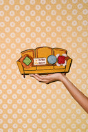 <p>Our hand-beaded Couch Pouch is the ultimate conversation piece. </p>