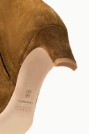 Cigar suede ankle boot close-up with printed insole logo on lining