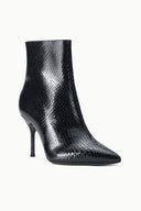 Black snake-print ankle boot, side view, slim stiletto heel