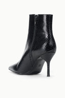 Black snake-print ankle boot with side zipper and pointed toe