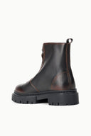 Distressed espresso leather-look zip ankle boot with chunky lug sole