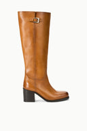 Cashew brown tall pull-on boot with top buckle detail and block heel