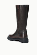 Espresso brown tall leather boots with stitched panels and chunky platform lug sole