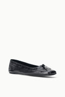 Black pointed-toe flat loafers with bow detail and smooth leather
