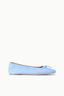 Light blue flat ballet shoes side view with bow-tied toe and low flexible sole