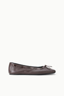 Espresso brown slip-on ballet flat with bow detail and stitched trim, side view.