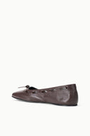 Espresso brown ballet flat with bow detail and stitched trim, angled toe view.