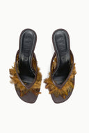 Pair of espresso brown mules with faux-fur fringe and stitched leather lining