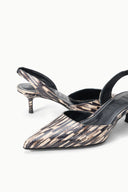 Slingback pointed-toe heel pair with quill-pattern straps and black lining
