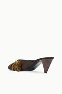 Espresso brown heeled mule with side profile and gold feather-trim detail