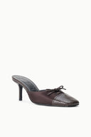 Espresso mule with snake-print upper, lace front, and slim stiletto heel.
