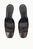 Espresso mules with snake-texture toe and lace-up front, top view.