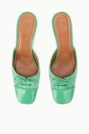 Seafoam green mule heels with pointed toe, lace-up bow front, tan insole lining