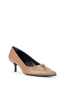 Tan leather pointed-toe kitten heel pump with lace-up bow and black interior