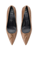 Pair of tan leather pointed-toe kitten heel pumps with bow-tie detail