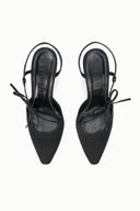Pair of black pointed-toe heeled sandals showing insoles and tie-back ankle straps