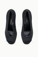Pair of black satin peep-toe wedge heels, back view and insole detail