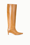A single knee-high leather boot in a warm tan or camel shade, featuring a pointed toe and a low kitten heel, shown from a side profile on a clean white background.