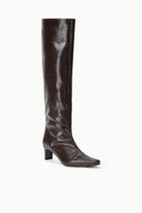 Front view of dark espresso brown knee-high snake-embossed boot with low block heel.