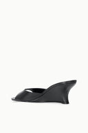 Black slip-on wedge sandals with sculpted midsole and open toe